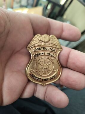 Saint Paul Junior Fire Dept. Instructor Badge - Gold Tone Metal 2 1/4 X 1 2/3